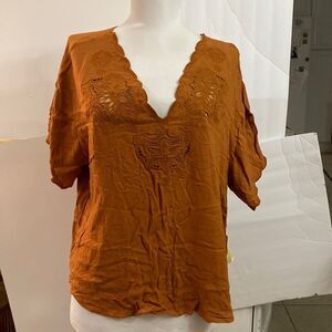 Rust appliqué cut outs neck sleeve 100 viscose brand new
